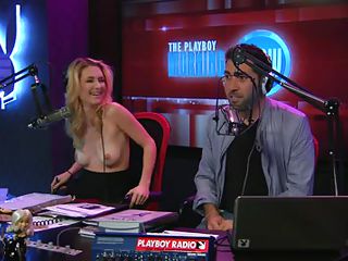 Playboy Radio has a morning show and one of the DJ's is a model named Andrea Lowell. This babe does the Lowell Report, where she takes her top off and reports on news stories from around the world. Her and her partner discuss the topics, which are usually odd in some way.