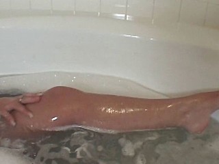 POV of a hungry nympho sucking a massive chode in the tub